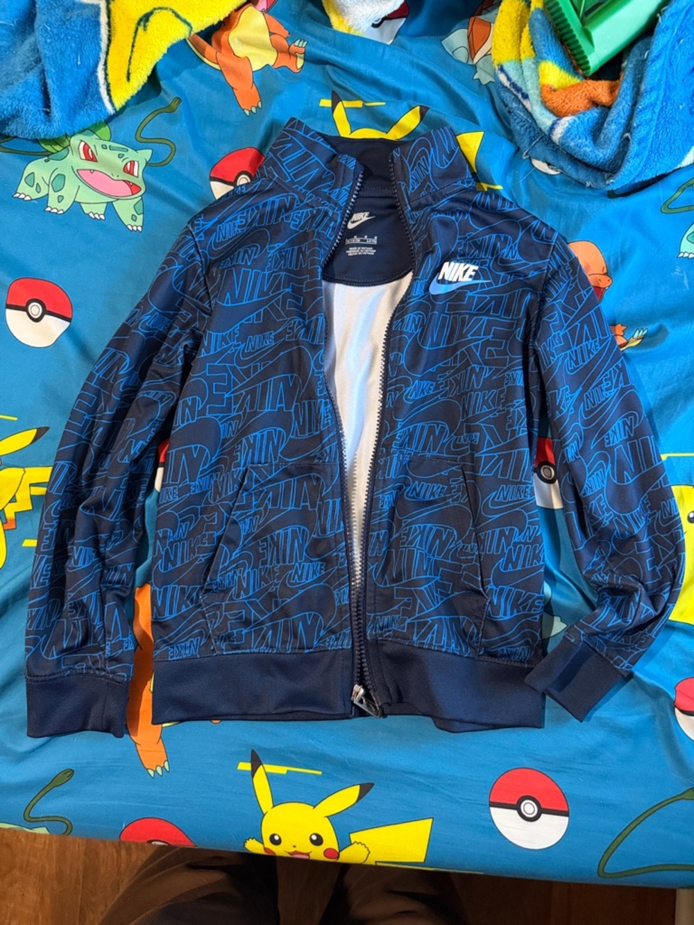 Nike Navy and Bright Blue All-Over Logo Track Jacket